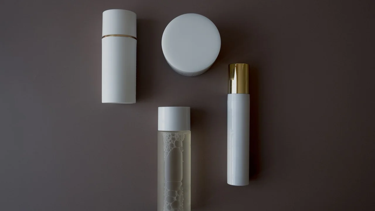 Plain cosmetic containers viewed from above
